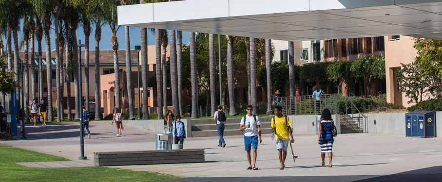 Students walking around the LMU campus near the Hannon library