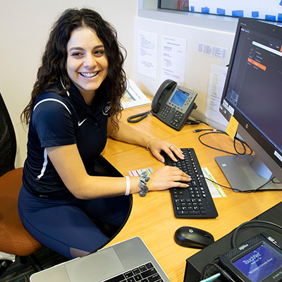 Fitwell team member smiling