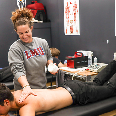 Athletic trainer cupping student