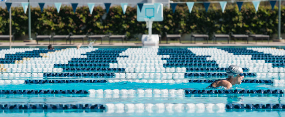 an over shot view of the brc pool with one lap swimmer