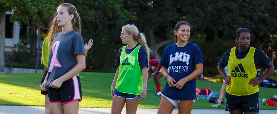 lmu women's soccer team on the field