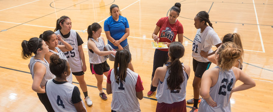 intramural women's sports team gathered together in the brc courts