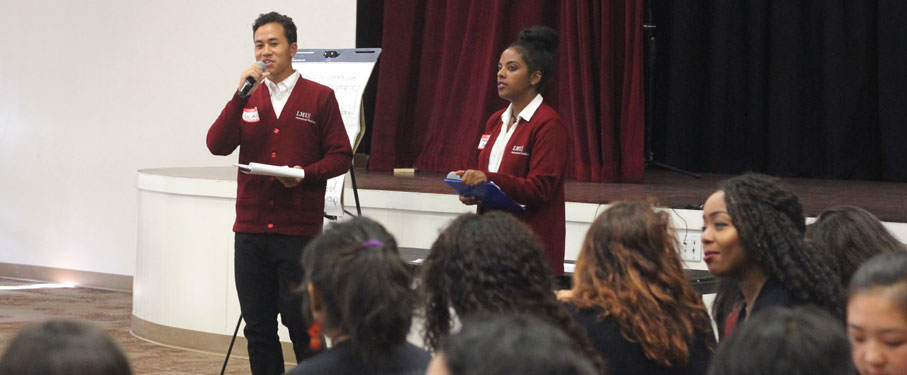 LMU intercultural facilitators presenting in front of an audience