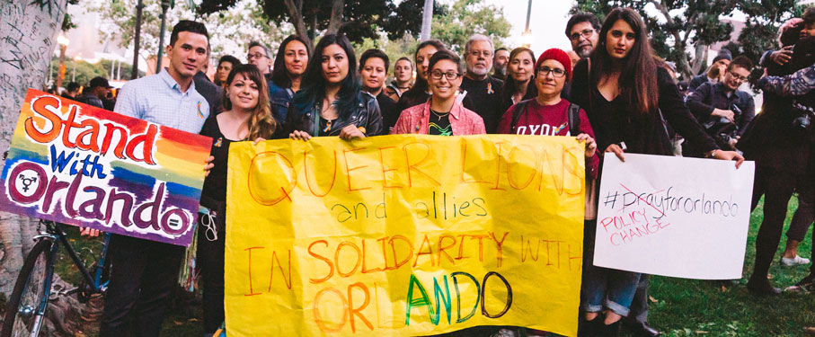 lmu students holding banner