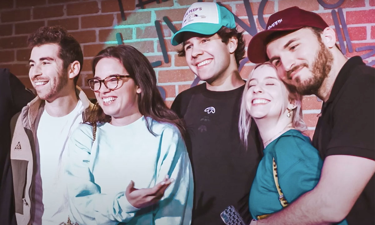 Class of 2019 graduation students celebrating in caps and gowns