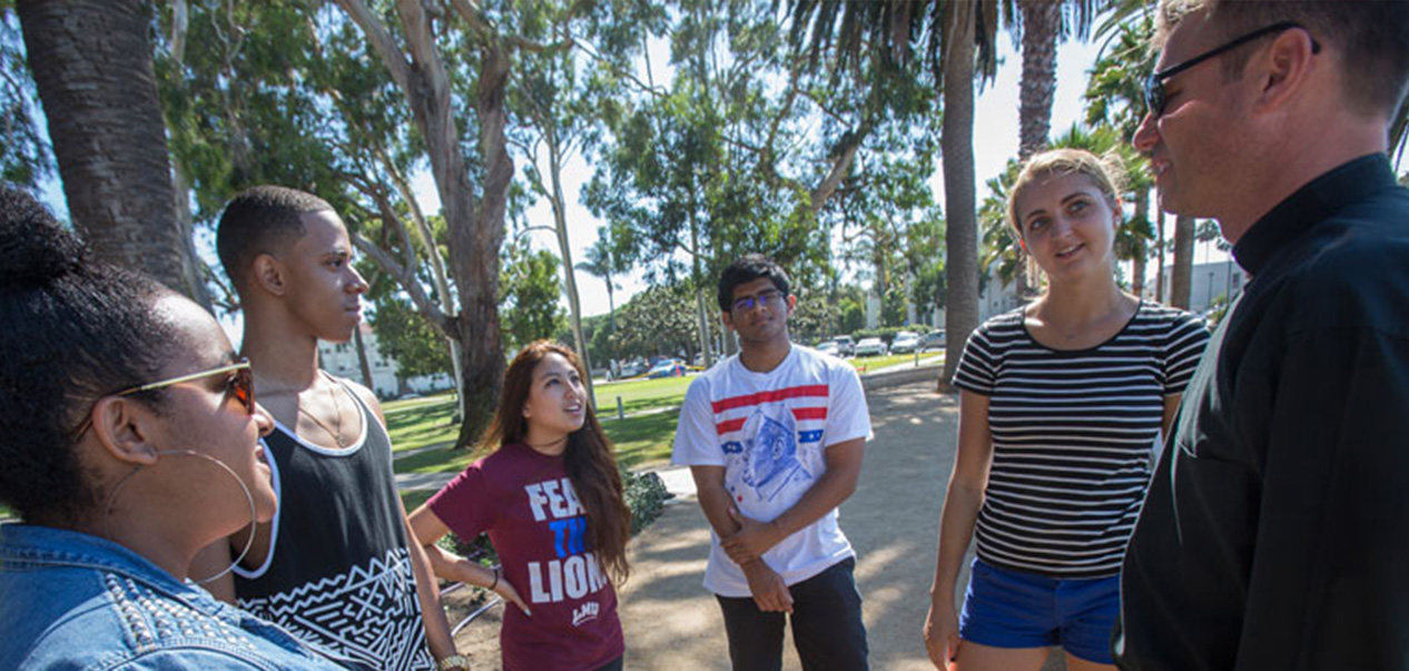 A group of students meeting outside