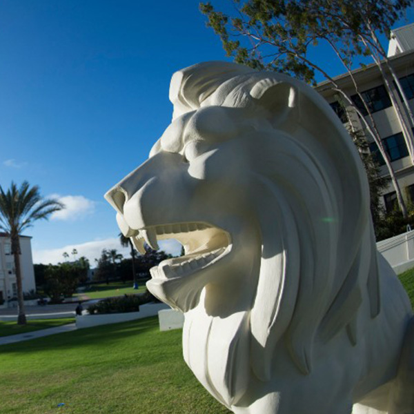 The white Lion statue outside of Malone Student Center.