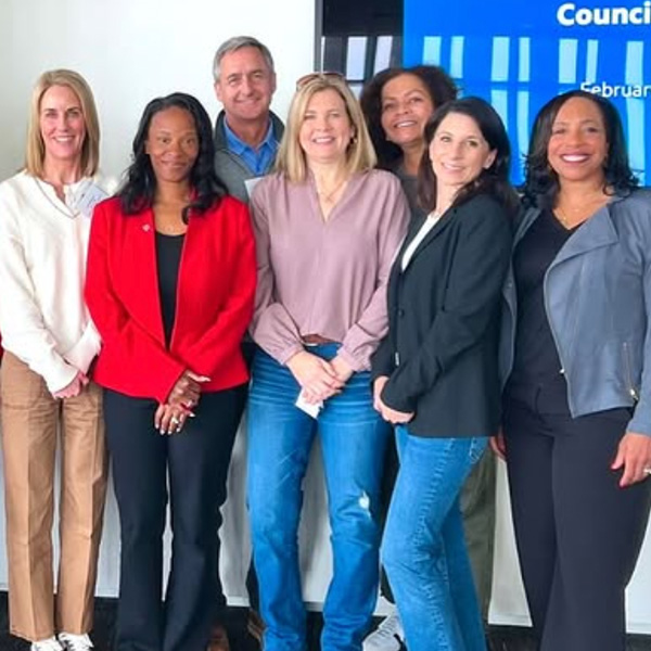 Members of the Parent and Family Leadership Council pose for a photo in the VDA Suite of Hannon Library.