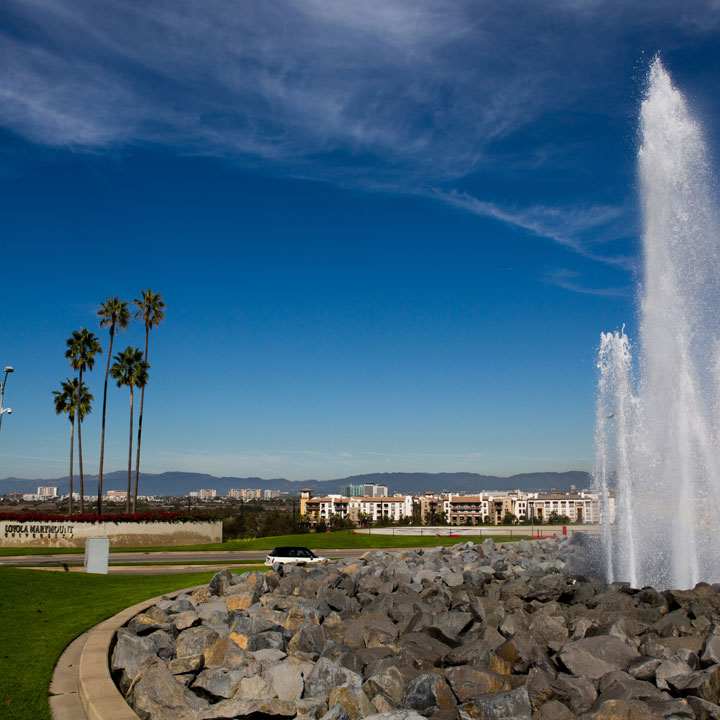 A scenic view of the water fountain in front of LMU.