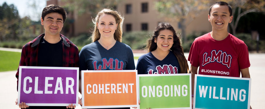 LMU students holding banners with the criteria for consent.