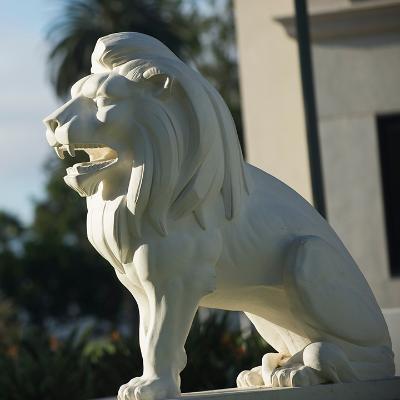 The statue of the Lion that sits outside of the Malone Student Center.