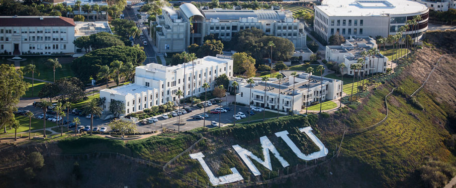 The iconic LMU sign located on the side of the bluff