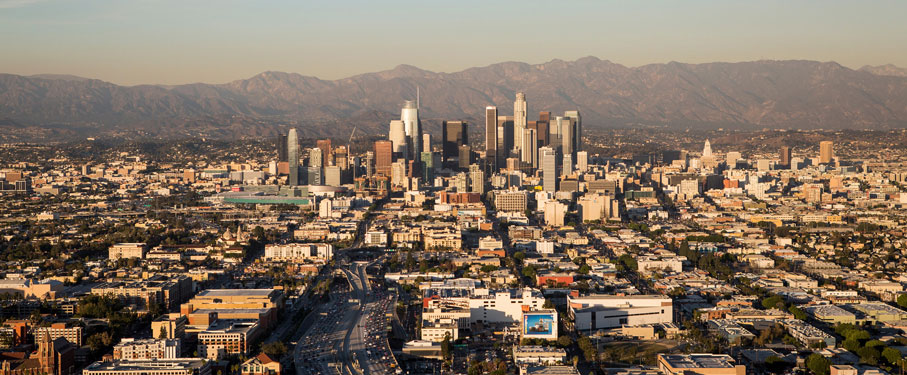 buildings with mountains in the background