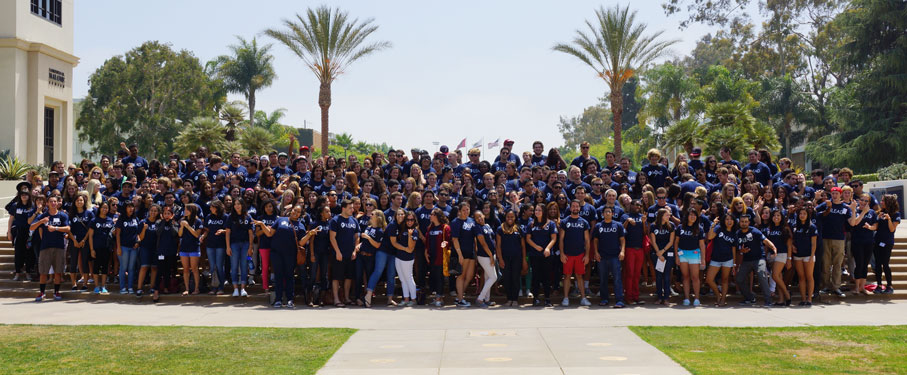 Students posing for a group picture at Regents Terrace