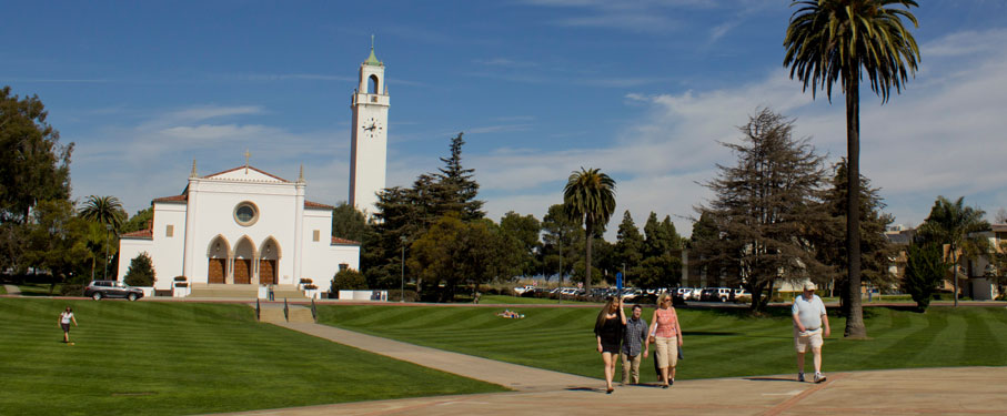 LMU students and family walking from the Sacred Heart Chapel